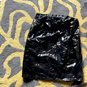 BLACK LATEX SKIRT SIZE 4